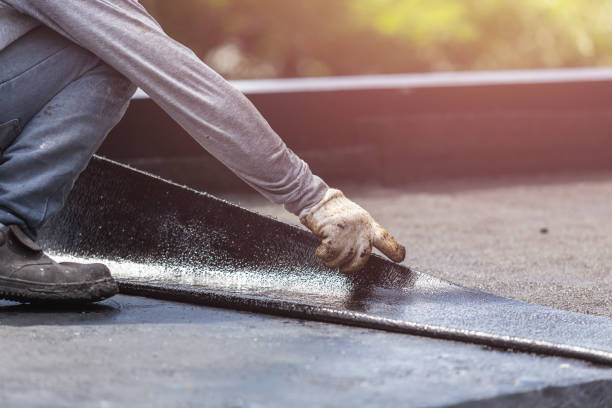 Professional Basement Waterproofing technician working in Freedom, IN